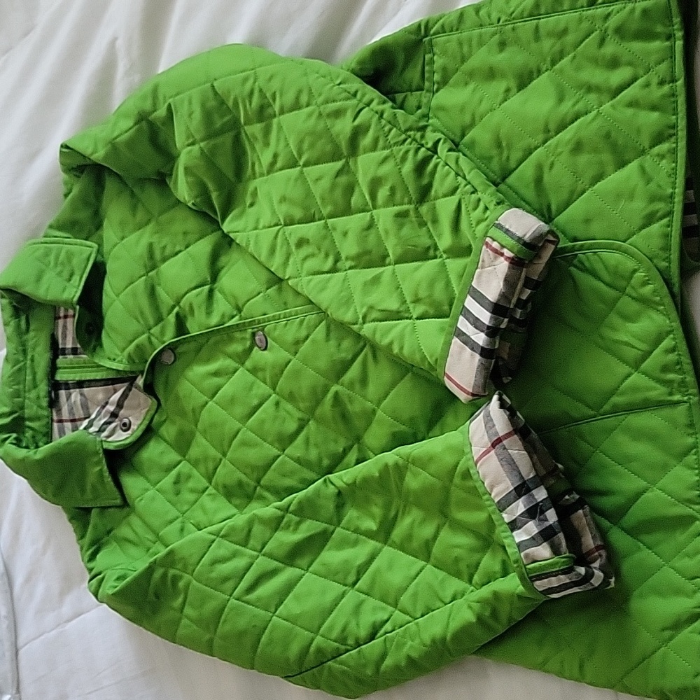 BURBERRY JACKET --Womens size Med  27 in length armpit 22 in.